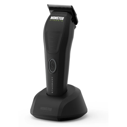 Monster Clippers Cerberus Hair Clipper side view on charging stand on a white background