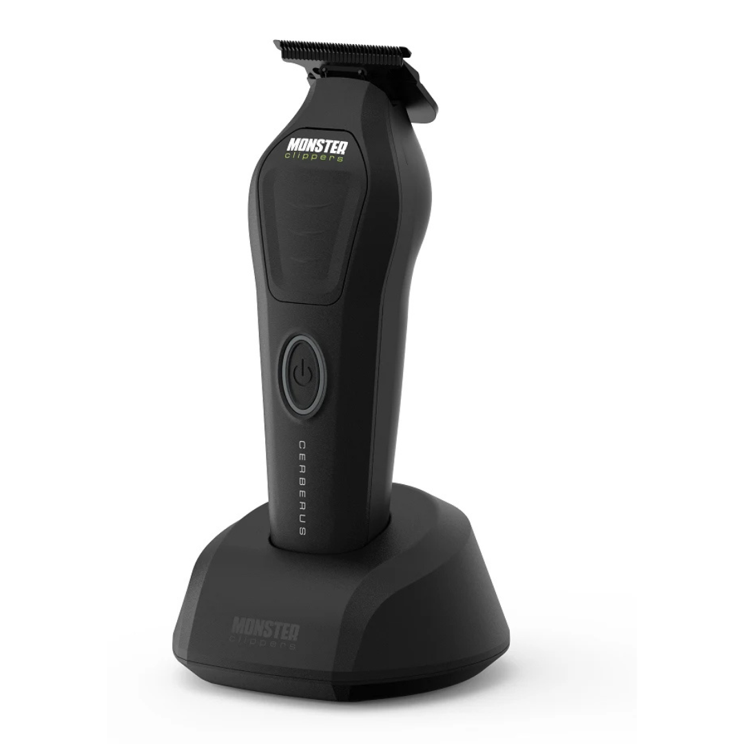 Monster Clippers Cerberus Hair Trimmer in black side view on charging stand on white background