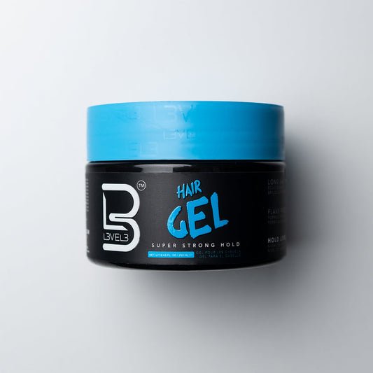 Jar of hair gel with blue lid on a white background