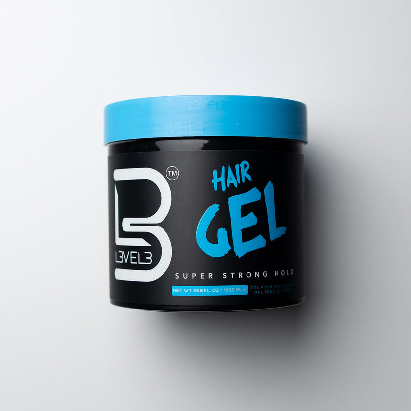 Black hair gel container with blue lid on a white background
