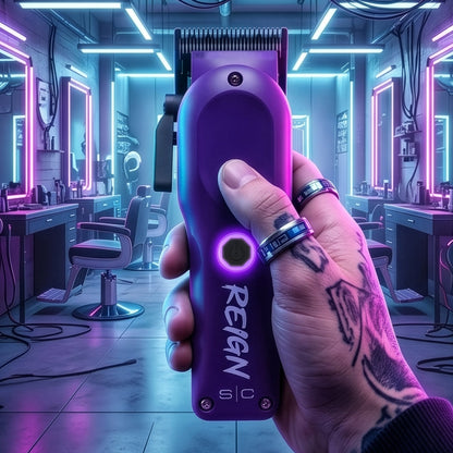 Purple hair trimmer with 'Reign' branding held in a hand against a salon background